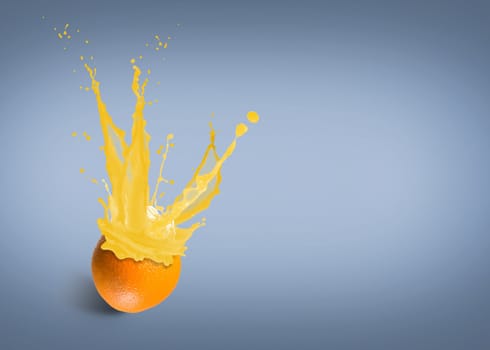 ice cubes fall into the orange, spray and splashes of juice