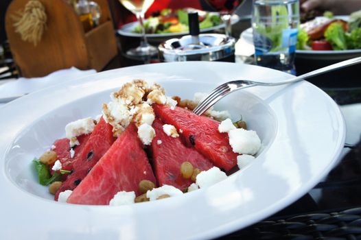Water-melon salad in the restaurant                      