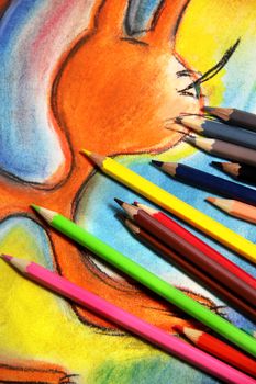 Mix of multicolored vivid pencils and paint picture