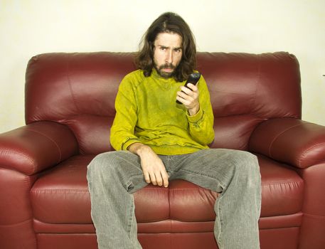 man on the couch remote control