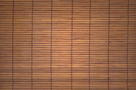 Bamboo mat background. The asian mat from yellow bamboo