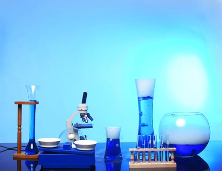 School Desk With Science Equipment in Use