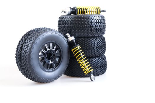 wheels and shock absorbers on a white background