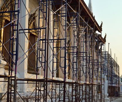 Renovation of old church with scaffolding, Thailand