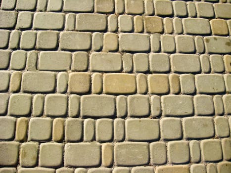 The image of roadway laid out from a white brick