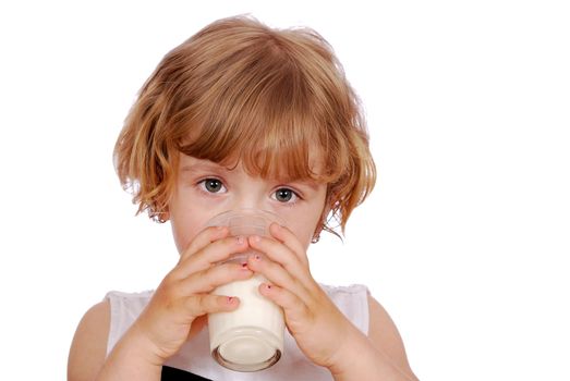Beauty little girl drinking milk