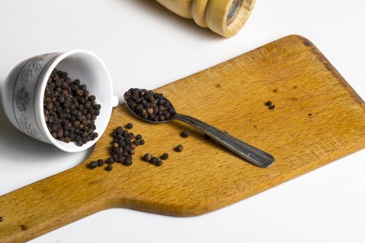 Close-up of lots of black pepper seeds