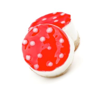 Two Polka Dot Cheesecakes with Strawberry Jelly closeup on white background