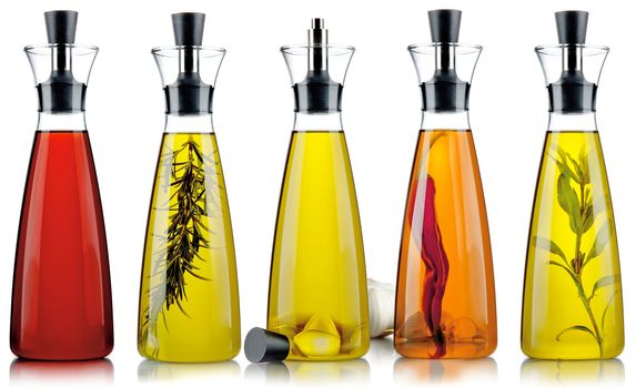five types of bottles of oil and vinegar on white background 