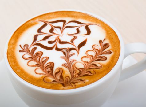 Chocolate  cappuccino time.Cup of coffee close up
