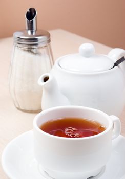 cups of tea with a teapot  .close up