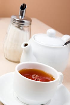 cups of tea with a teapot  .close up