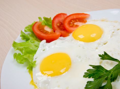 Delicious egg with vegetable close up .morning meal
