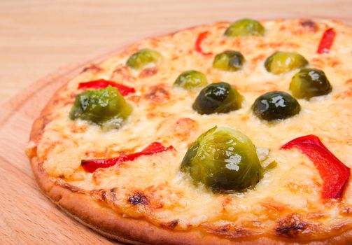 vegetable pizza with brussels sprouts.Italian kitchen.close up