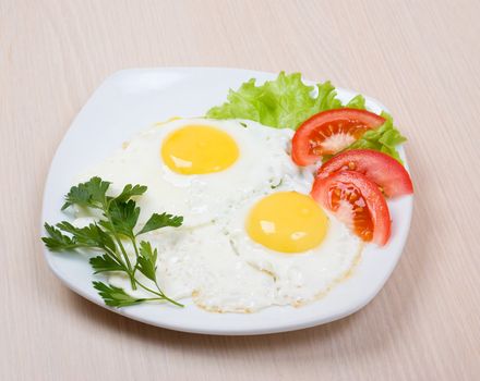 Delicious egg with vegetable close up .morning meal