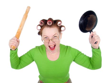 Woman in hair rollers is holding . Very frustrated and angry mad woman. Angry look on face. Studio, white background. 