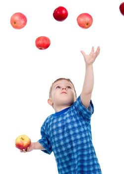 Little boy  caughts flying apple  .isolated on white background