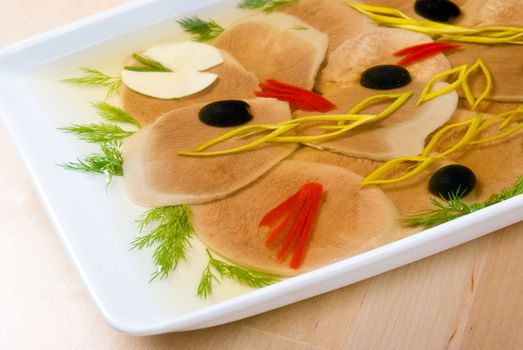 Aspic from meat with egg,olives