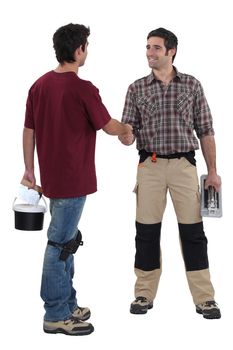 Decorators shaking hands