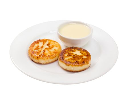 pancakes takenwith sweet sauce in natural light on plate