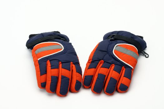 Pair of winter ski gloves on white