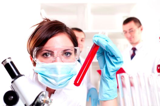 chemist working in the laboratory, mix liquid