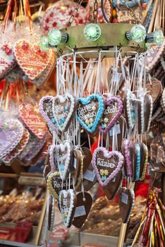 Colorful traditional gingerbread hearts at Christmas market in Germany