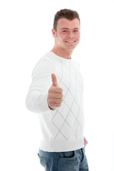 Happy handsome man standing sideways looking at the camera with a smile giving a thumbs up of approval and success isolated on white