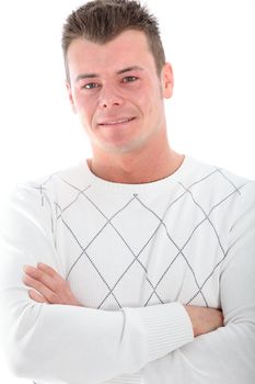 Smiling good-looking young man with a modern spiky haisrstyle standing with folded arms, closeup upper body cropped portrait isolated on white Smiling good-looking young man with a modern spiky haisrstyle satnding with folded arms, closeup upper body cropped portrait isolated on white