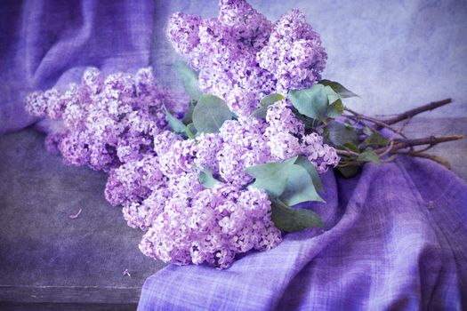 bouquet of lilacs on the table with a cloth, still life, painting