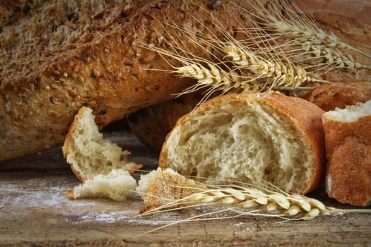 Closeup of loaves of bread on wood table