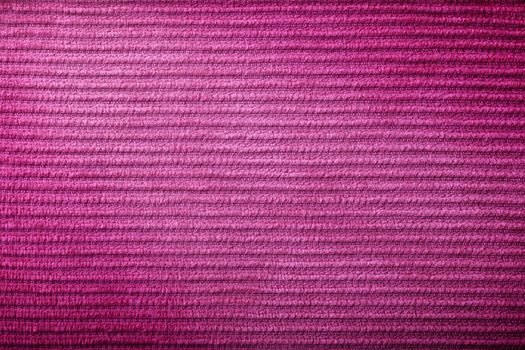 Pink corduroy texture for background. Close-up shot