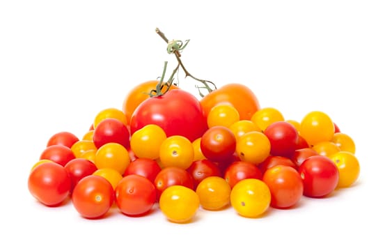 Heap Multicolored Ripe Fresh Cherry Tomatoes on white background