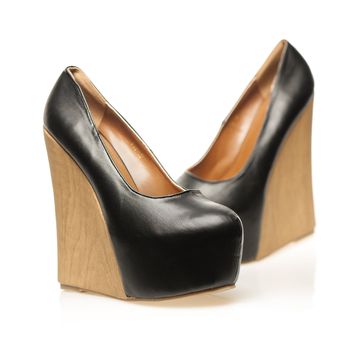 High Heels with extreme platform sole in wedge style.