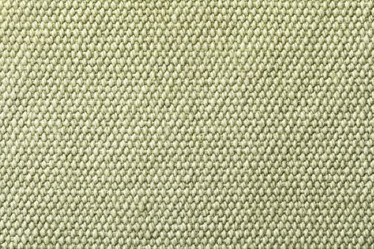 Green cotton background texture. Macro shot, top view