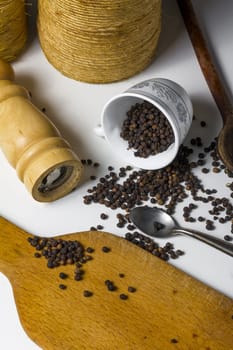 Close-up of lots of black pepper seeds