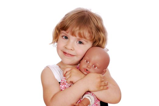 Beauty little girl with baby doll toy