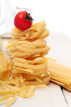 Spaghetti with vegetables isolated on white background