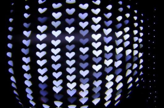 Defocused hearts light background