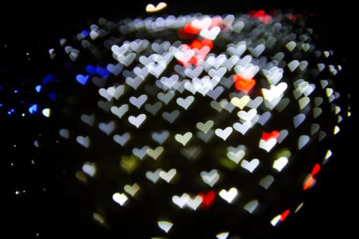 Defocused hearts light background