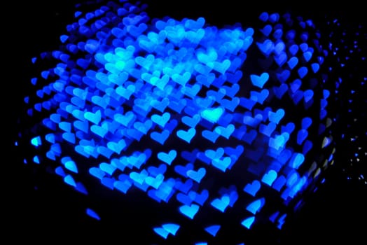 Defocused hearts light background