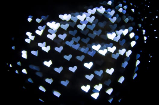 Defocused hearts light background