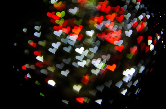 Defocused hearts light background