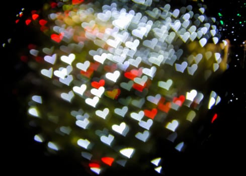 Defocused hearts light background