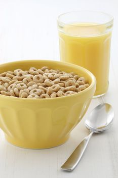Delicious and nutritious lightly toasted honey, nuts and oats cereal with orange juice.