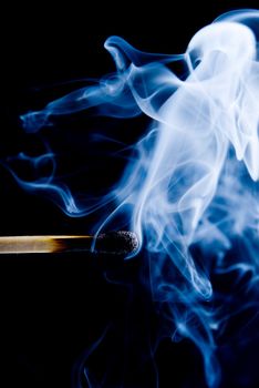 match smoke on a black background