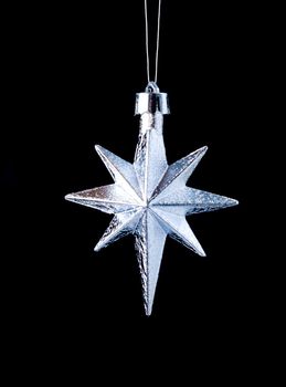 silver star on black background,Christmas bauble