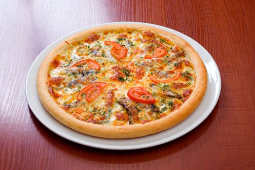 Pizza and italian kitchen. Studio. ,Close-up.tomatoes,sprats