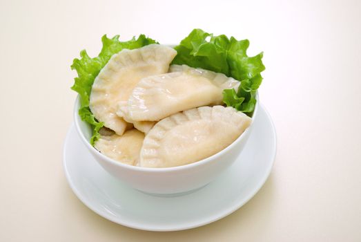 vareniks with cheese are Ukrainian foods closeup.dumplings
