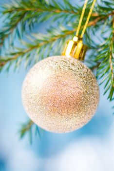 Fur branches and bright toy,Christmas tree ornaments